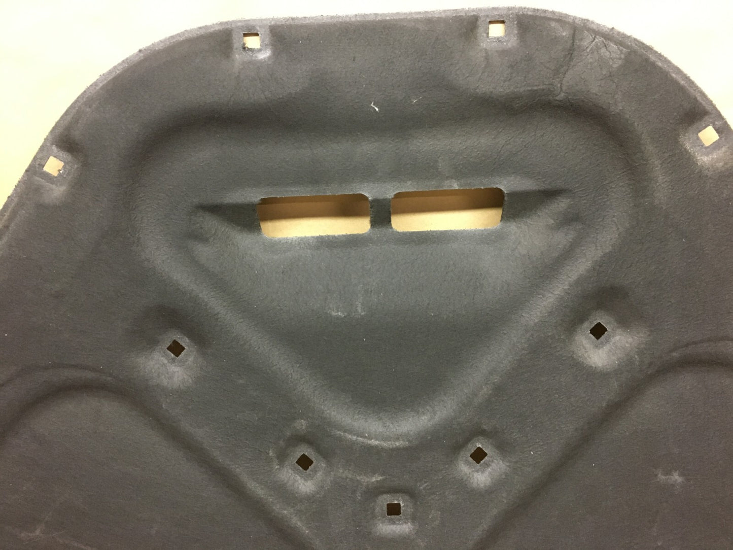Porsche Macan hood insulation pad — edge detail