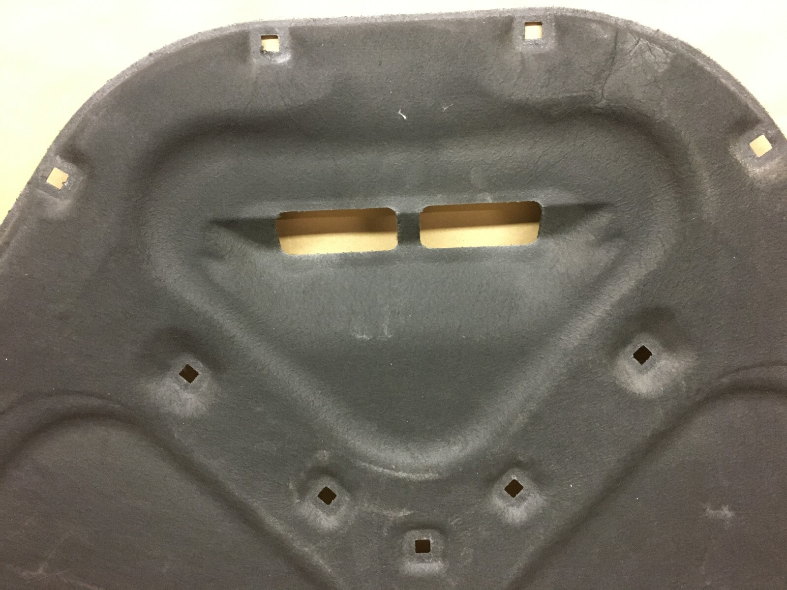 Porsche Macan hood insulation pad — edge detail