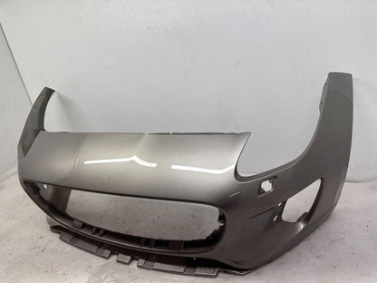 Jaguar F-Type front bumper side view with repaired spot