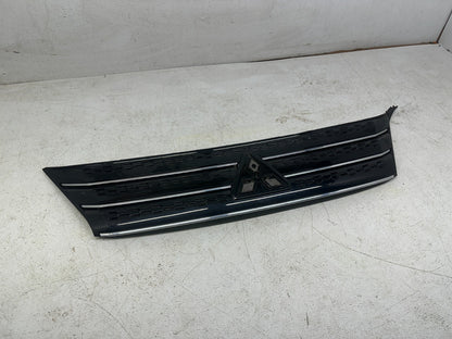 Mitsubishi Outlander front grille — back side and mounting tabs