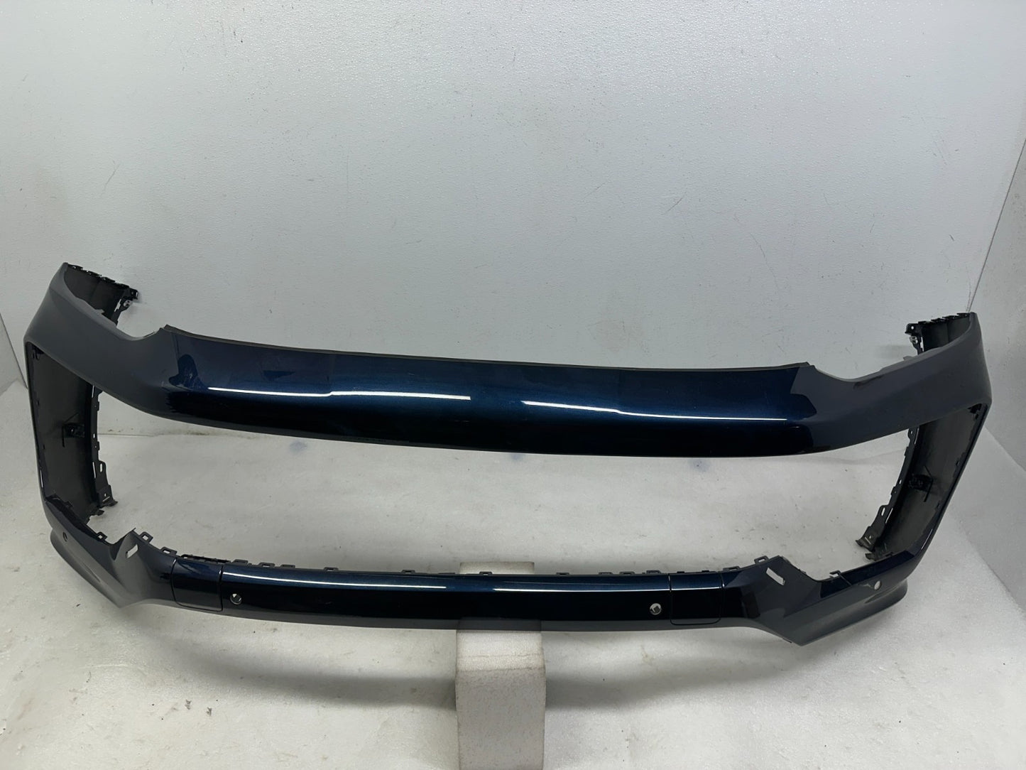 Porsche Cayenne OEM front bumper side view