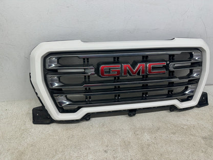 GMC Sierra 1500 OEM grille rear mounting tabs