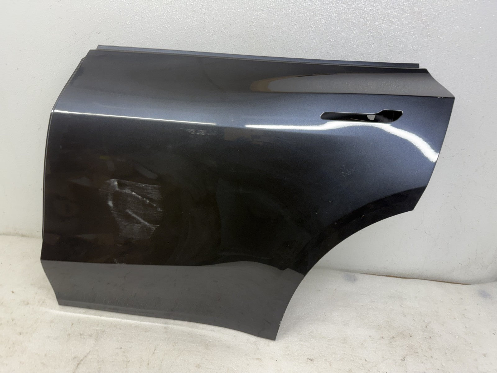 Tesla Model Y rear door outer skin detail
