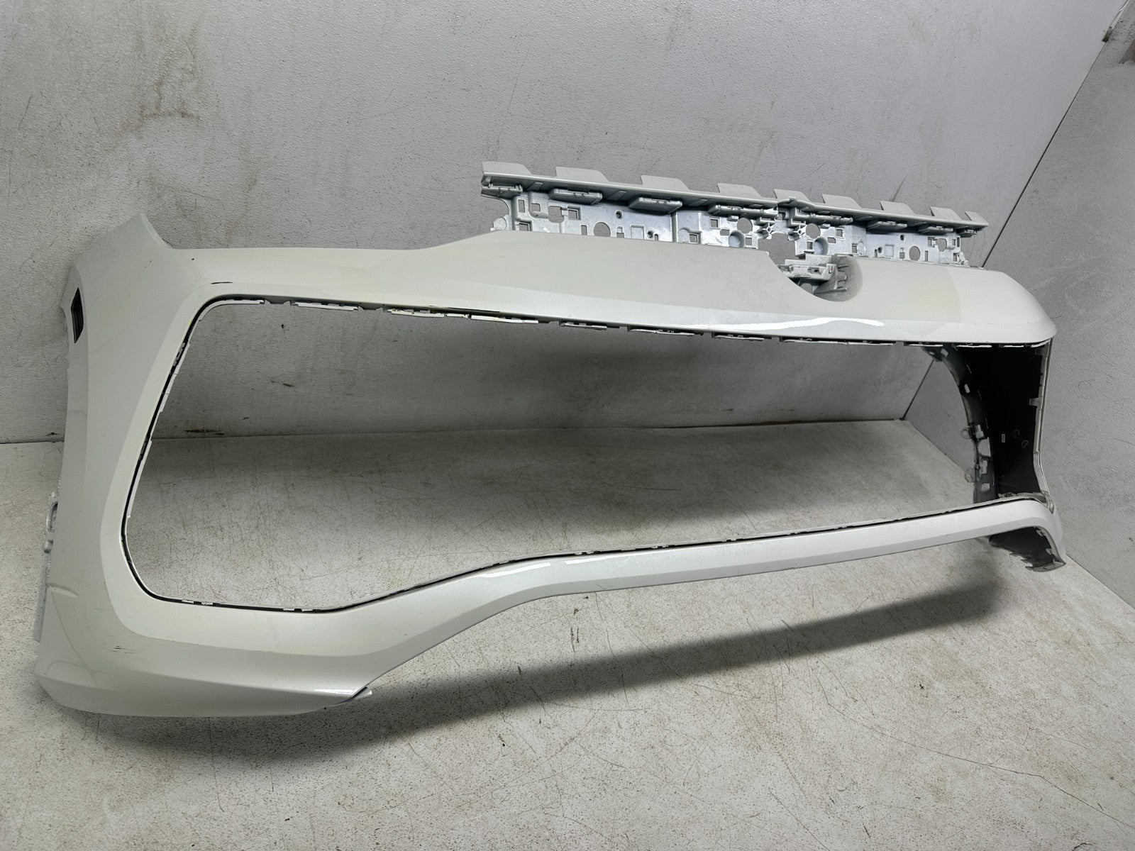 VW Tiguan front bumper cover — angled view