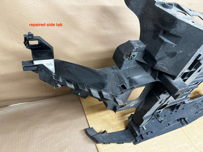 Mini Countryman radiator support repaired side tab close-up