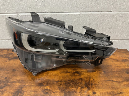 Mazda CX-5 RH headlight mounting tabs