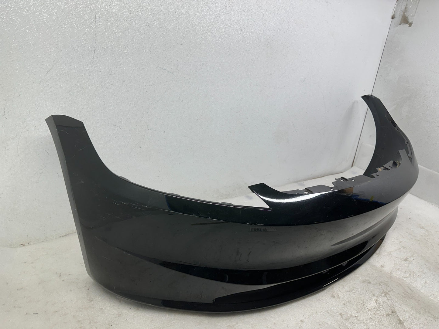 Tesla Model 3 front bumper cover side view