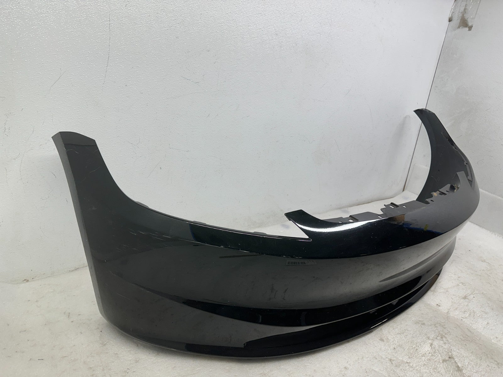 Tesla Model 3 front bumper cover side view