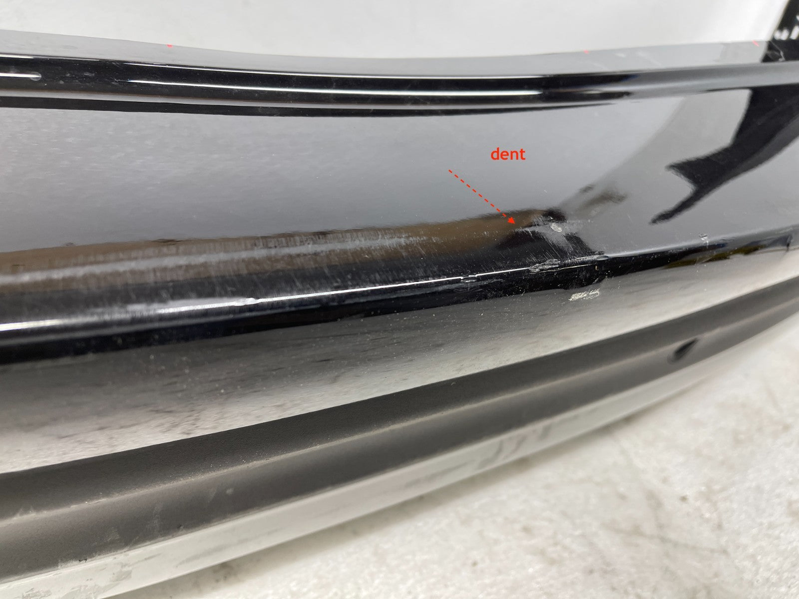 Lincoln Corsair rear bumper valance scratch detail