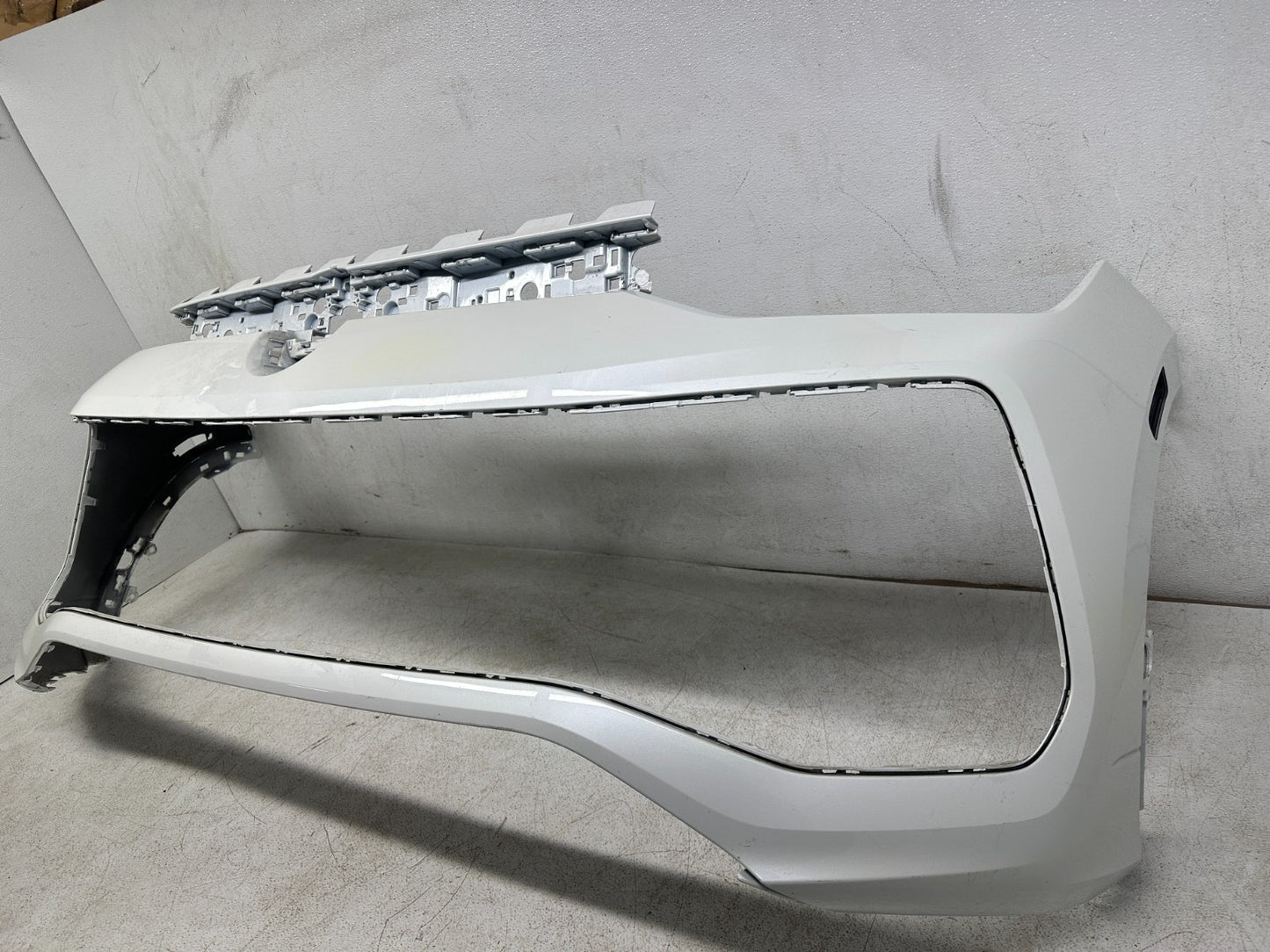 VW Tiguan front bumper cover — back side and mounting points