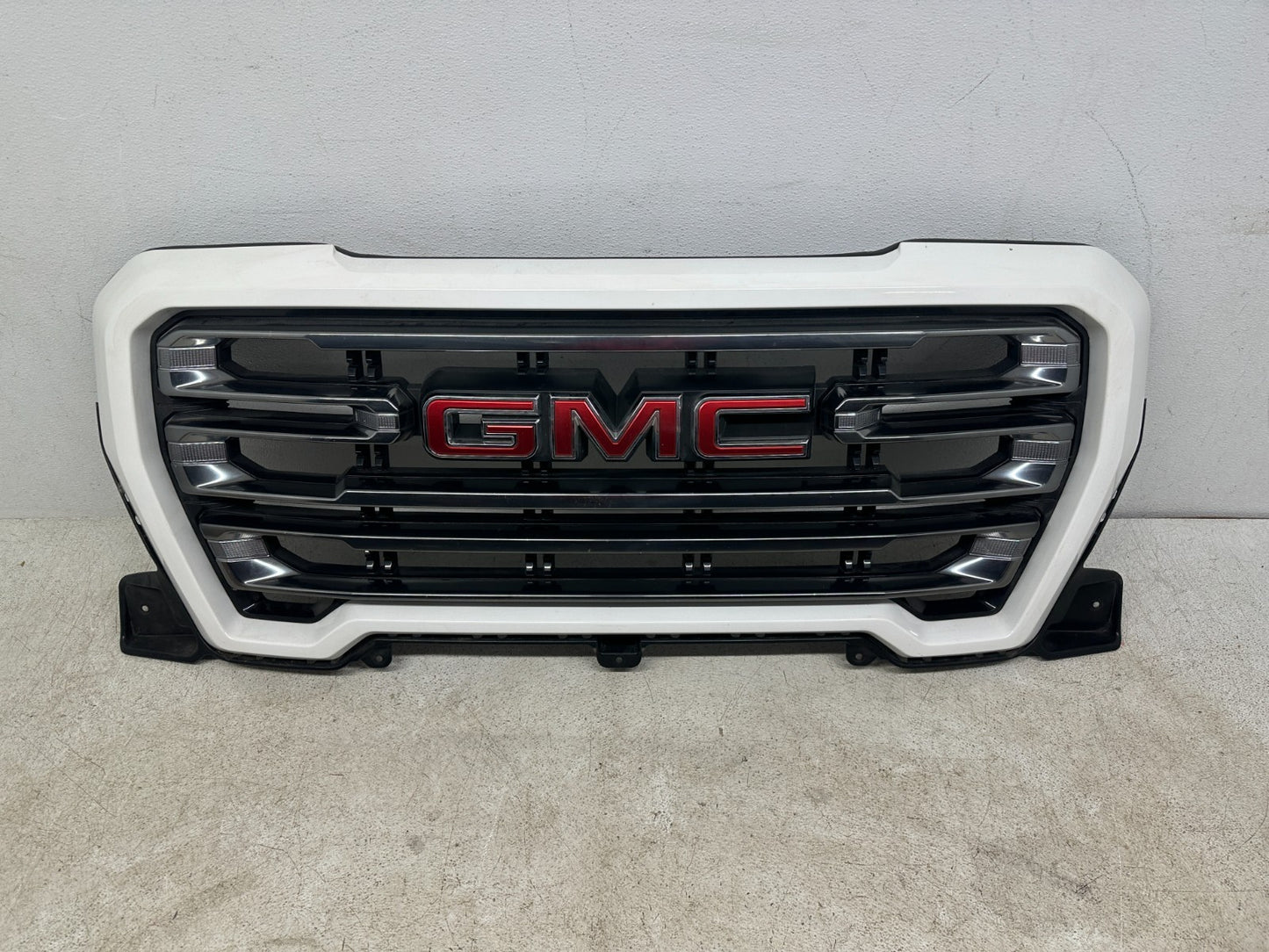 2019-2022 GMC Sierra 1500 SLT grille OEM 84458485 white front view