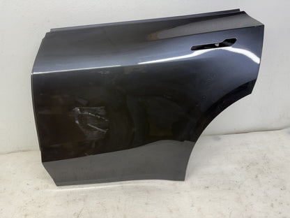 Tesla Model Y rear door scratch and dent detail